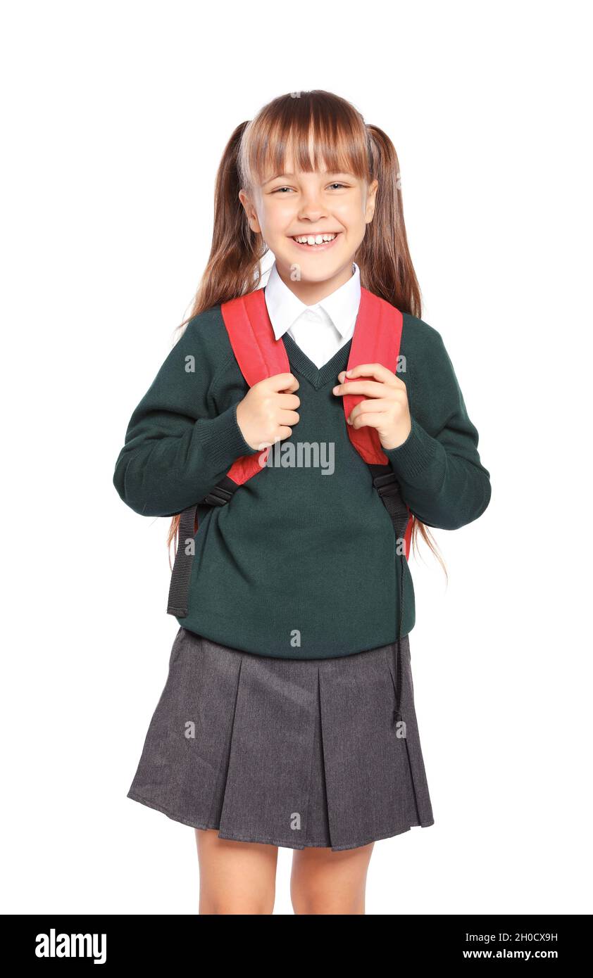 Little girl in stylish school uniform on white background Stock Photo ...