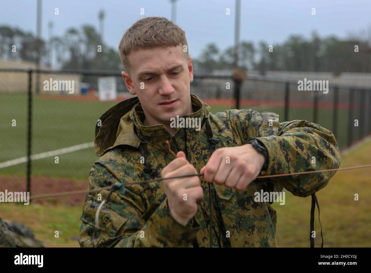 U.S. Marine Corps Cpl. Samuel Knowles, a radio operator assigned to the ...