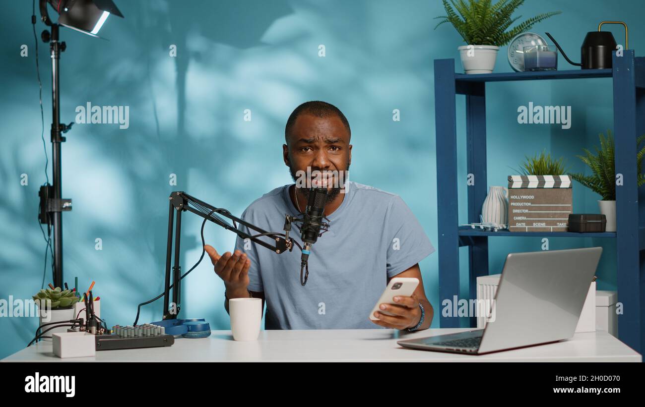 Frustrated vlogger giving bad news hi-res stock photography and images ...
