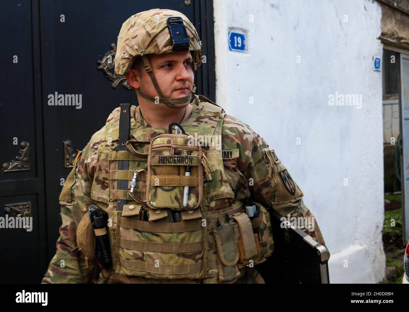 Sgt. Mark Henderson, a Soldier with the explosive ordnance disposal team attached to Regional Command-East, Kosovo Force, finishes testing an X-ray system during an EOD emergency call in Gjilan/Gnjilane, Kosovo, on Jan. 27, 2021. The EOD team used the X-ray to determine if an unexploded ordnance was safe to be moved. The 702nd Ordnance Company, based out of Grafenwoehr, Germany, is supporting the NATO-led KFOR mission, which is dedicated to ensuring freedom of movement for all people in Kosovo. Stock Photo