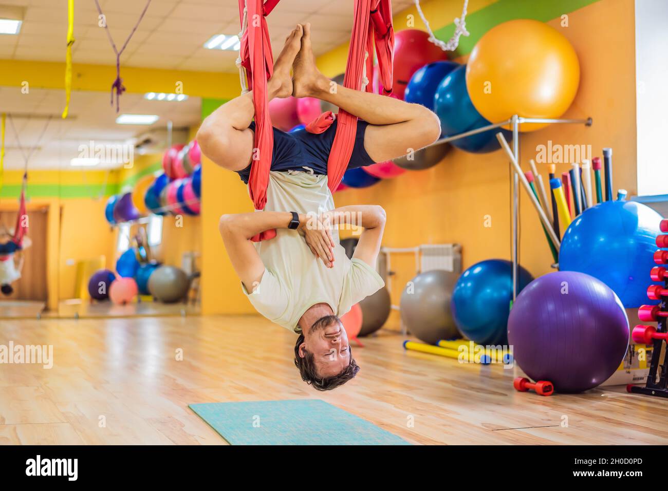 Aerial gymnastics man hi-res stock photography and images - Alamy