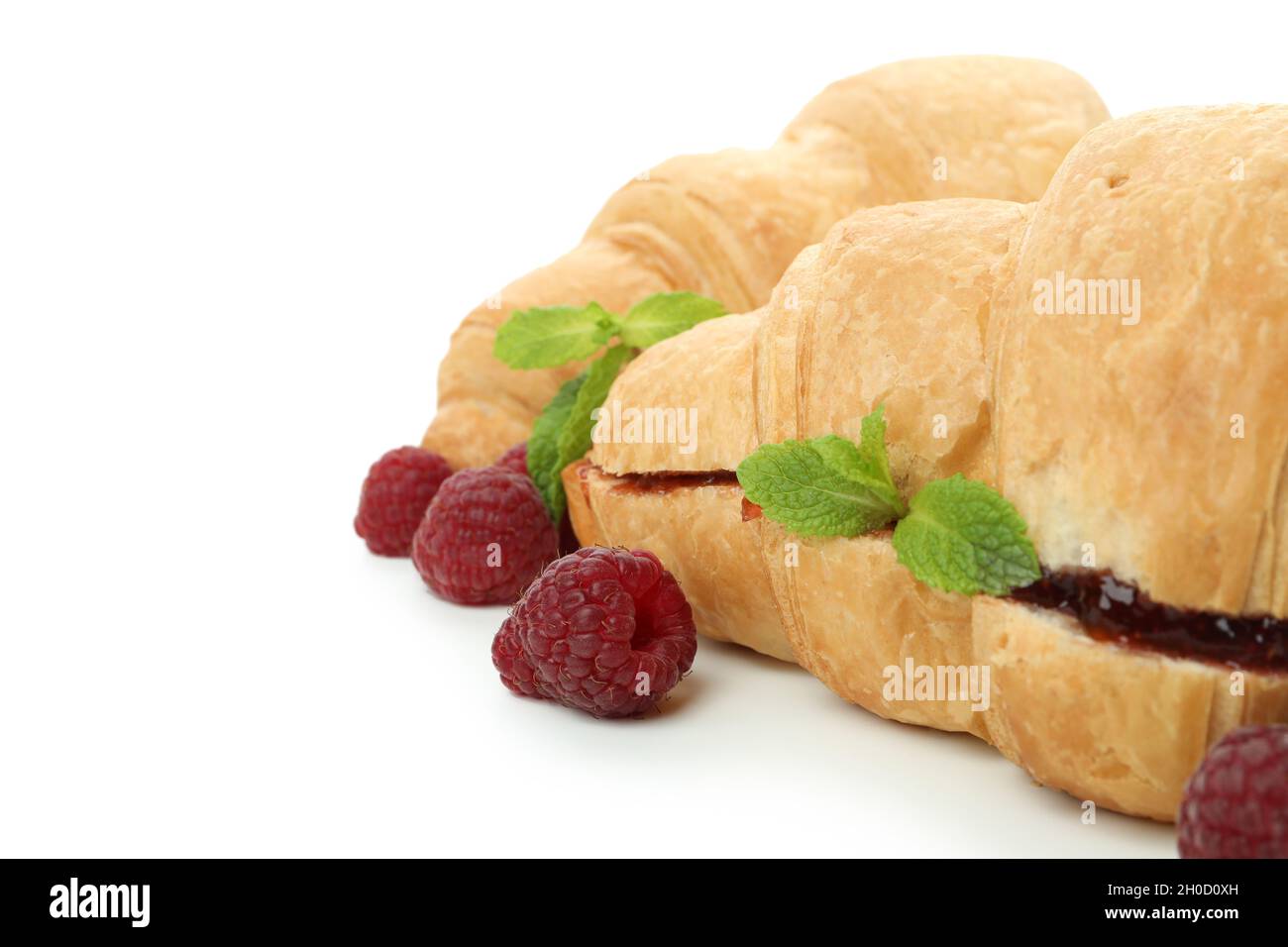 Croissants with raspberry jam isolated on white background Stock Photo