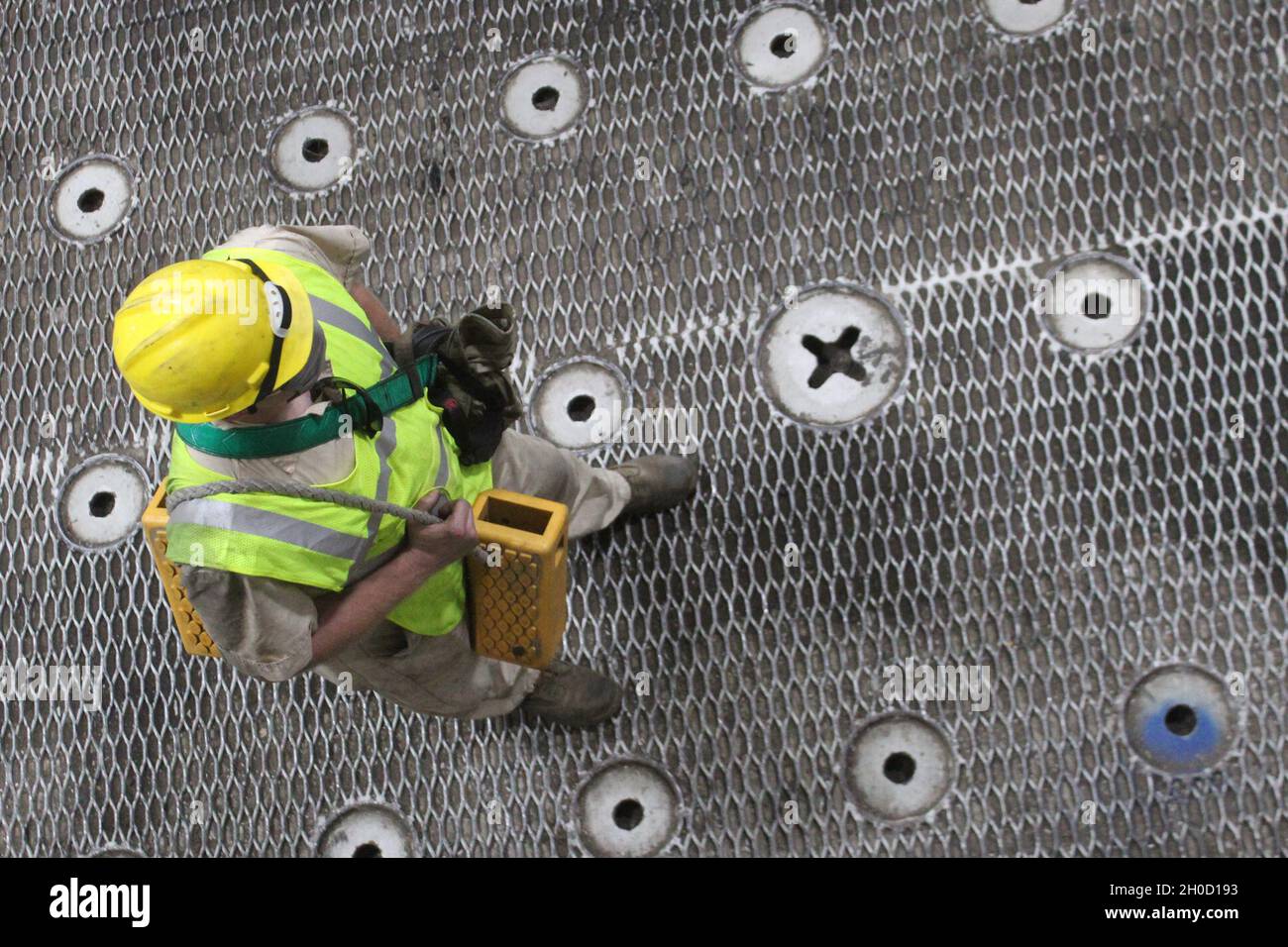 An Air Force mechanic walks through the deck of the Green Ridge during ...