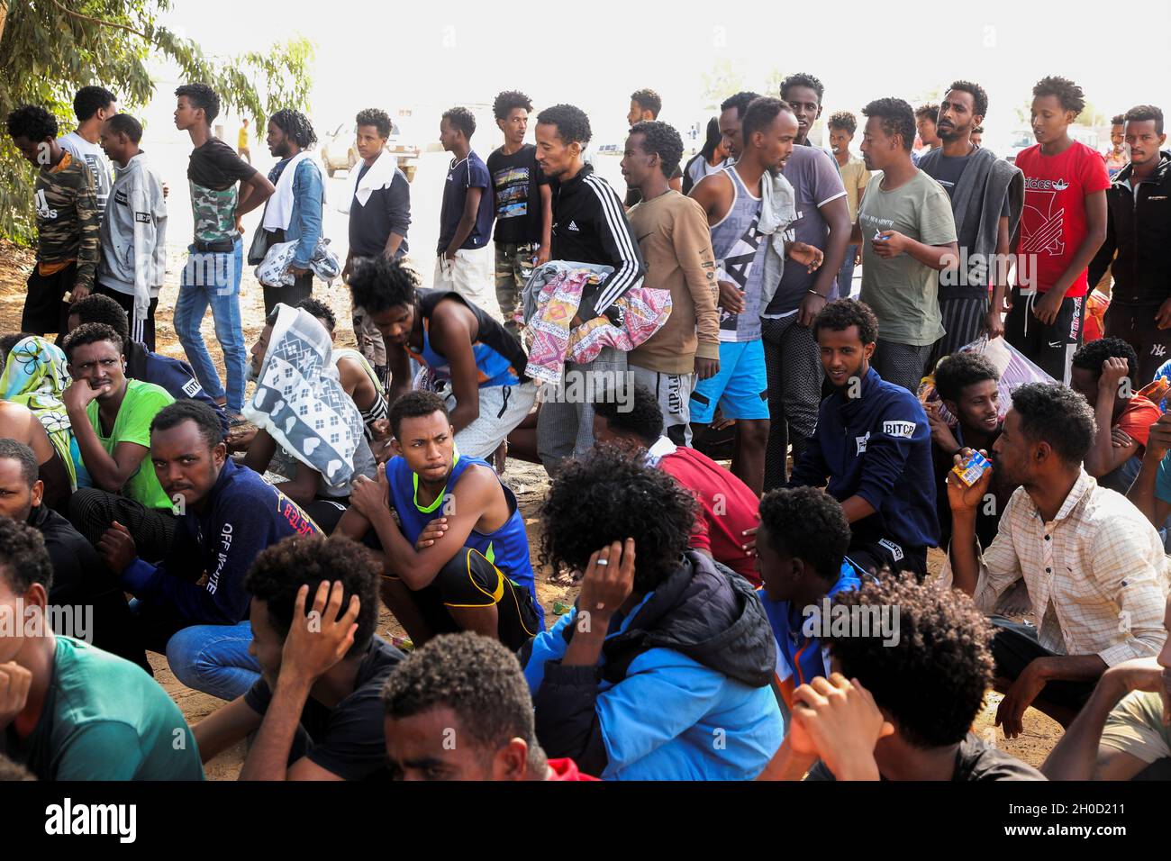 Migrants gather at a detention center at Ain Zara, in Tripoli, Libya  October 12, 2021. REUTERS/Hazem Ahmed Stock Photo - Alamy