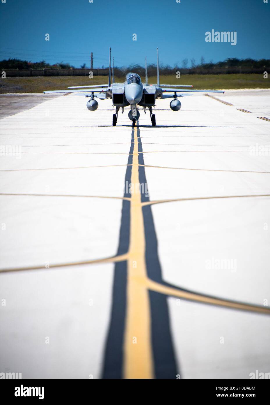 Two Japan Air Self-Defense Force, or Koku-Jieitai, F-15J Eagles taxi after landing at Andersen Air Force Base, Guam, during exercise Cope North 21, Jan. 28, 2021.  Cope North is an annual exercise that serves as a keystone event to promote stability and security throughout the Indo-Pacific. Stock Photo