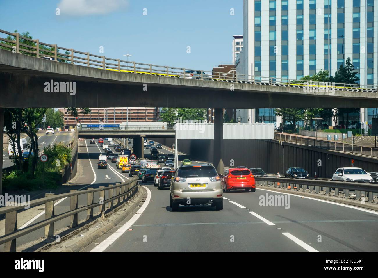 The M8 motorway in a cutting through central Glasgow. Stock Photo