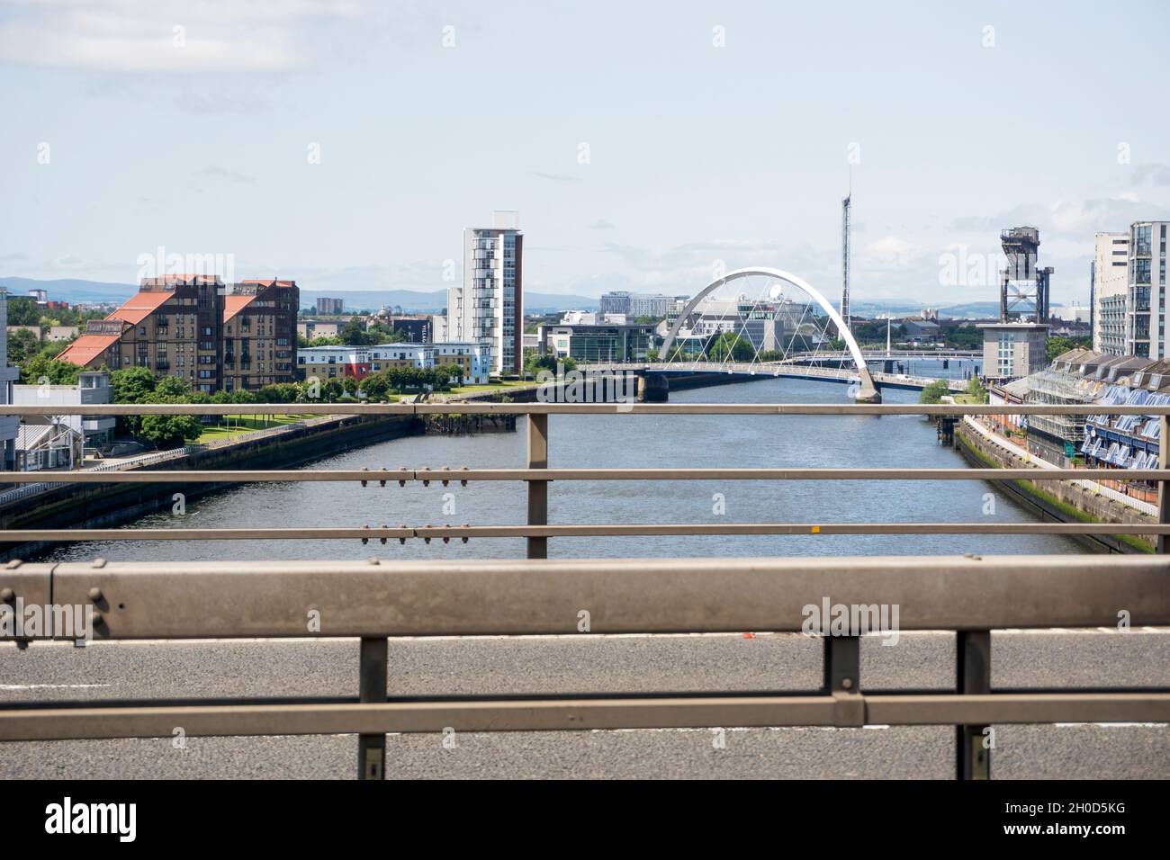 Crossing River Clyde on M8 motorway in Glasgow via Kingston Bridge.  Travelling north with view to the west showing the Clyde Arc or Squinty Bridge. Stock Photo