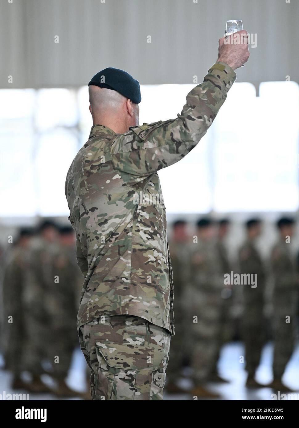 Lieutenant Colonel Patrick Toohey, commander, 4th Battalion, 1st Special Warfare Training Group (Airborne) toasts the Special Forces Regiment during a graduation ceremony at Fort Bragg, North Carolina January 28, 2021. The ceremony marked the completion of the Special Forces Qualification Course where Soldiers earned the honor of wearing the green beret, the official headgear of Special Forces. Stock Photo