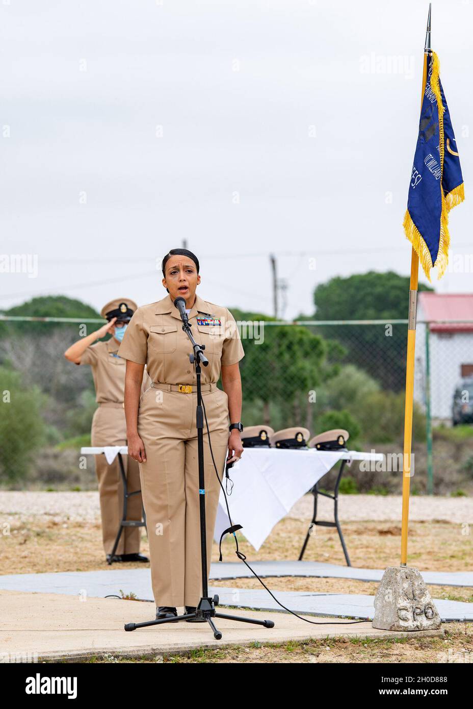 NAVAL STATION ROTA, Spain (Jan. 29, 2021) Chief Hospital Corpsman Select Alejandra McKeever sings “The Star-Spangled Banner” during a chief petty officer promotion ceremony at Naval Station (NAVSTA) Rota, Spain, Jan. 29, 2021. 7 NAVSTA Rota Sailors and 1 Airman were advanced during the ceremony, attended by friends, family and the NAVSTA Rota chief petty officer mess. Stock Photo