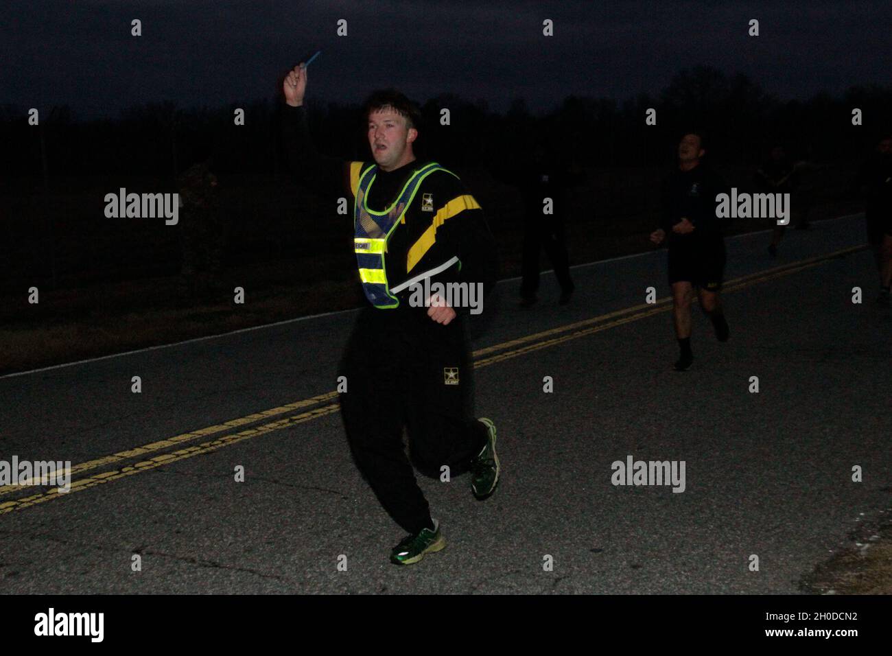 U.S. Army Soldiers finish a fourmile run during an Expert Infantry