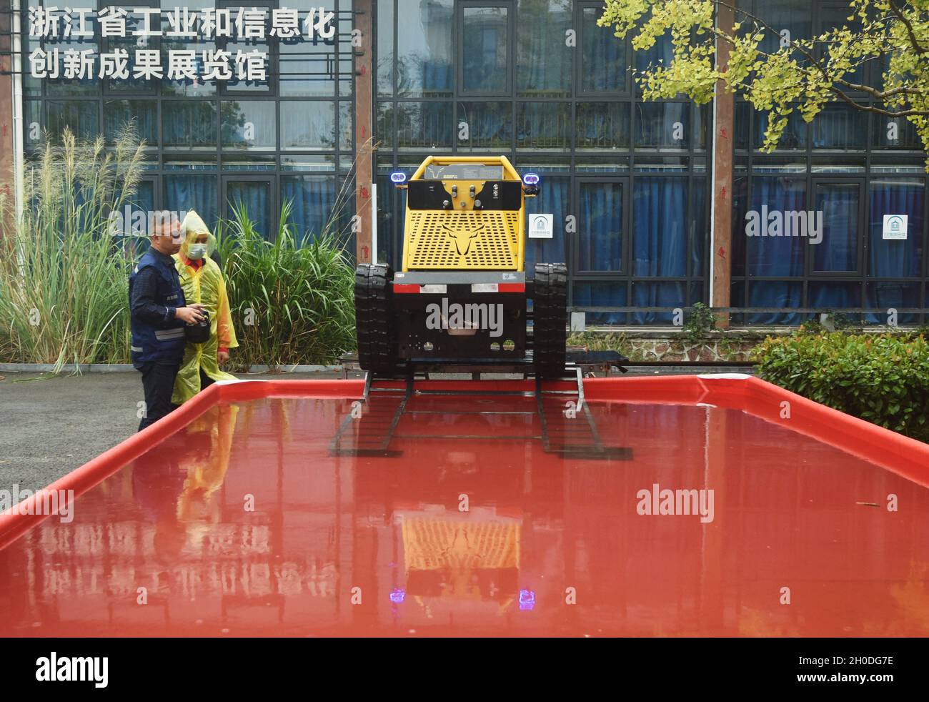 HANGZHOU, CHINA - OCTOBER 12, 2021 - A waterlogging robot named "Big  Buffalo" passes through the "flooded" zone during the zhejiang Joint  emergency rescue exercise on the international Day of Disaster Reduction