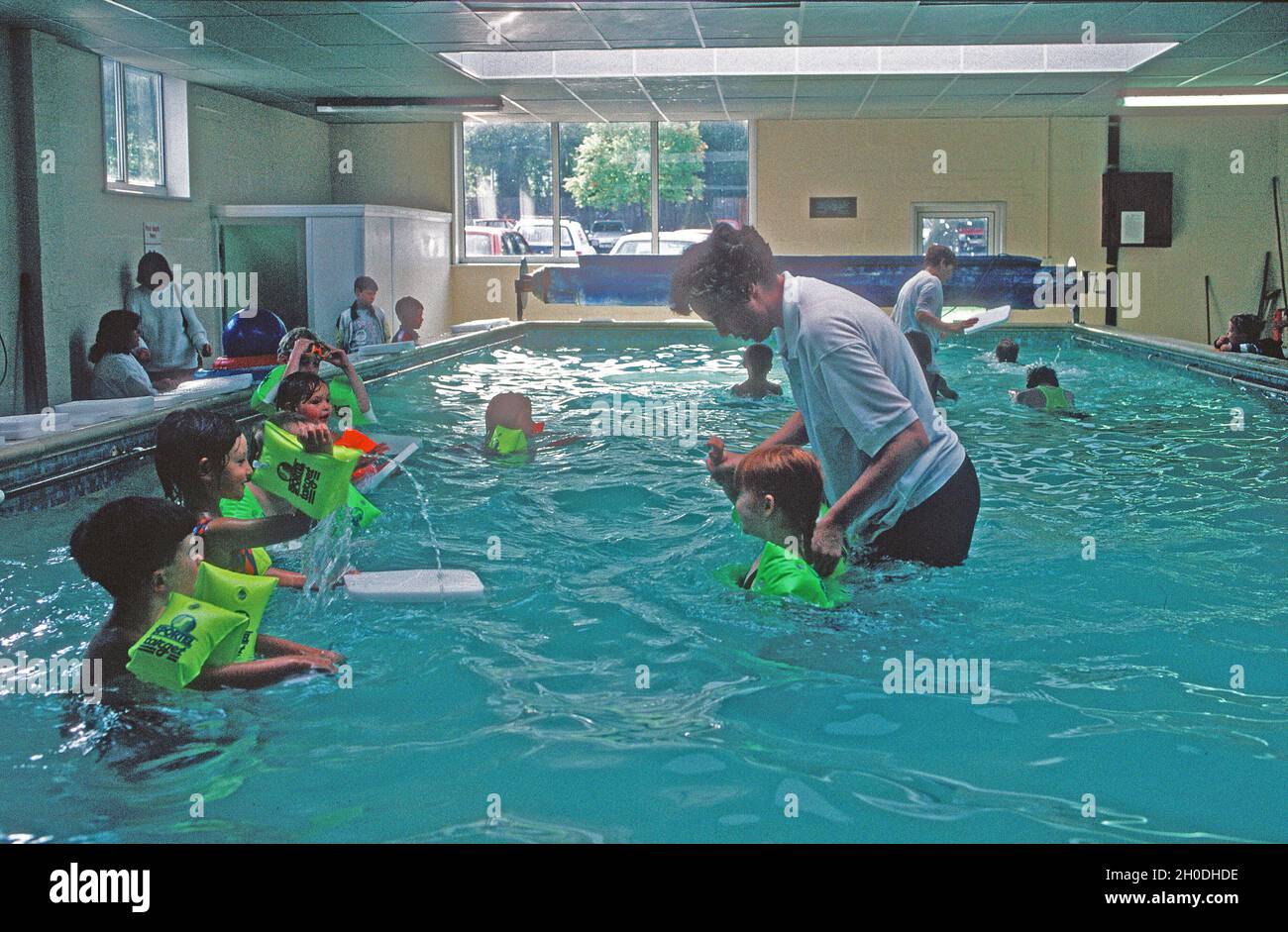 Five year olds first swimming lesson at a Solihull junior school 1994