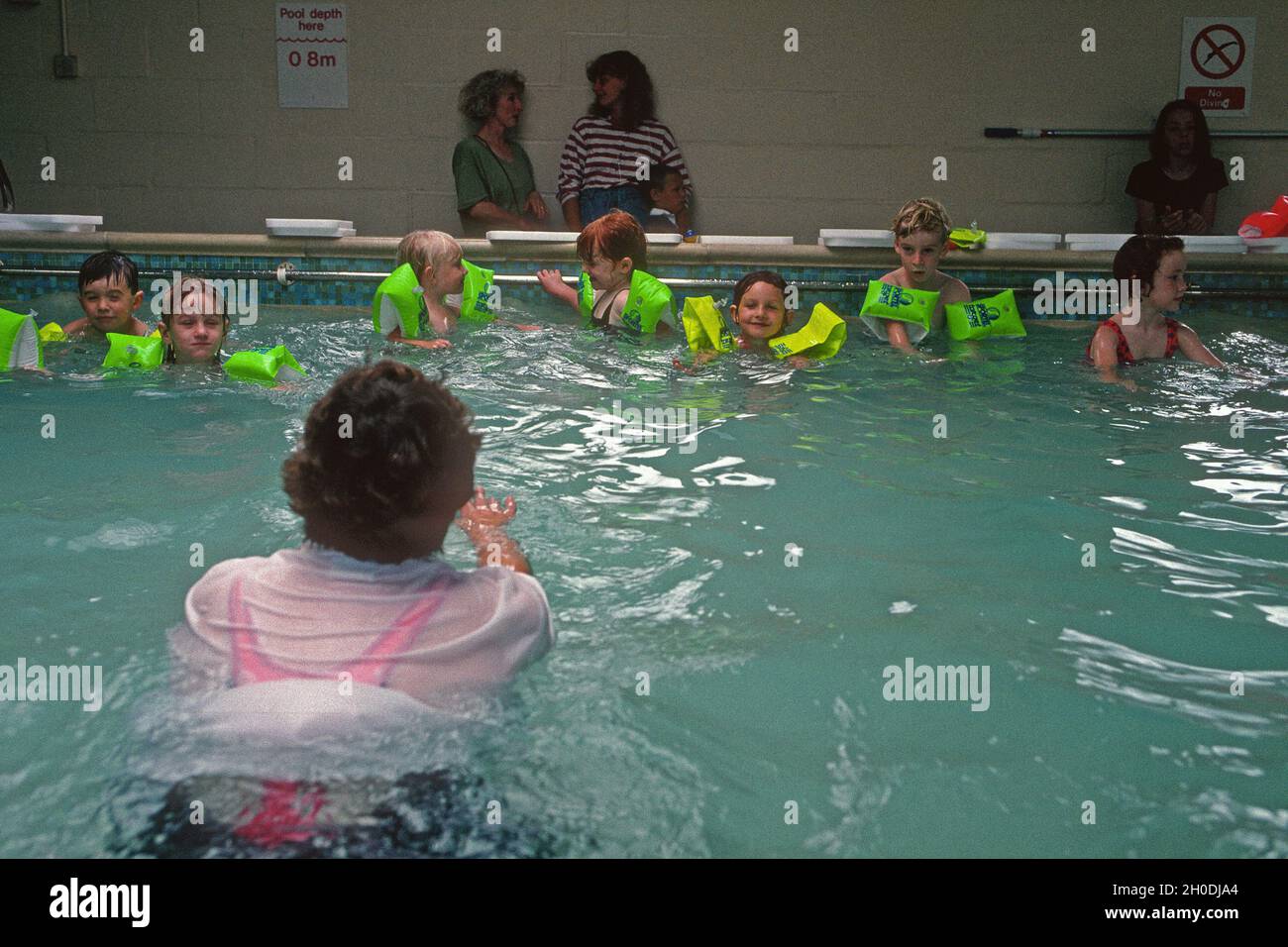 Five year olds first swimming lesson at a Solihull junior school 1994