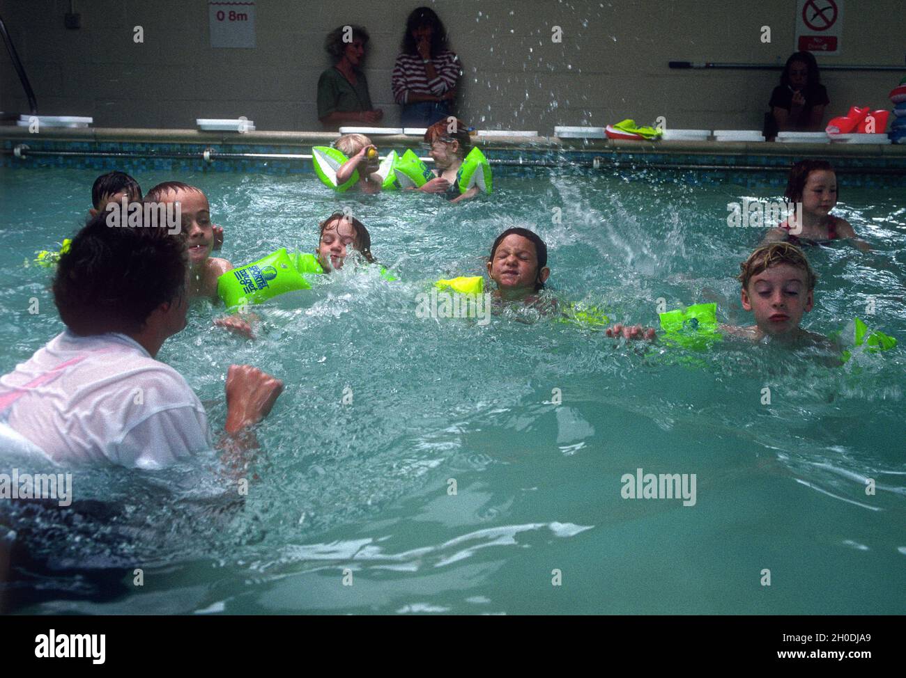 Five year olds first swimming lesson at a Solihull junior school 1994