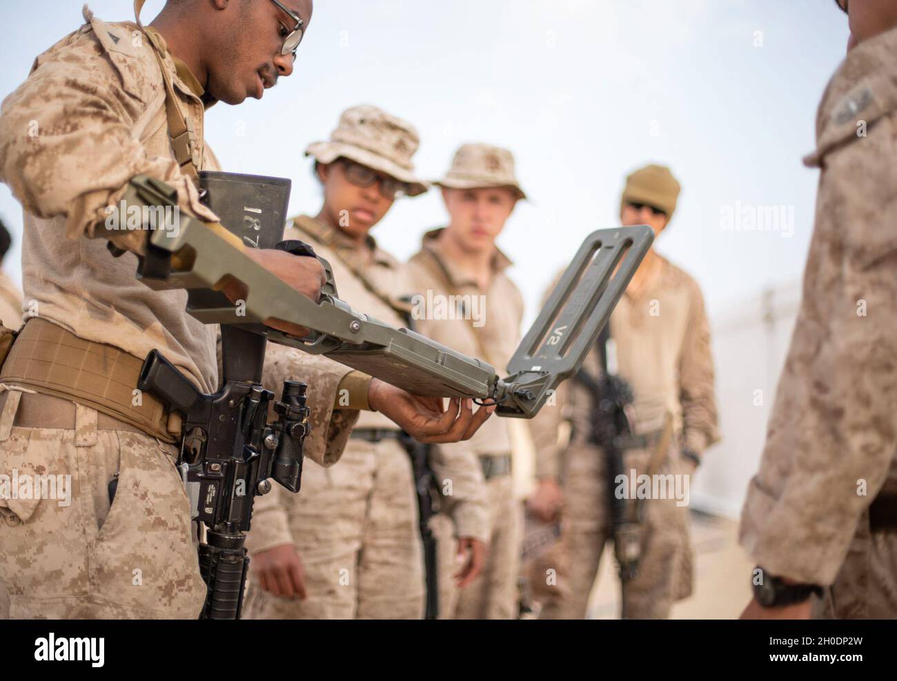 U.S. Marine Corps Lance Cpl. Solomon Toussaint, a transmissions systems ...