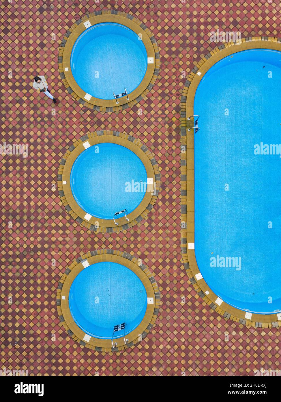 Aerial view of woman near pool Stock Photo - Alamy