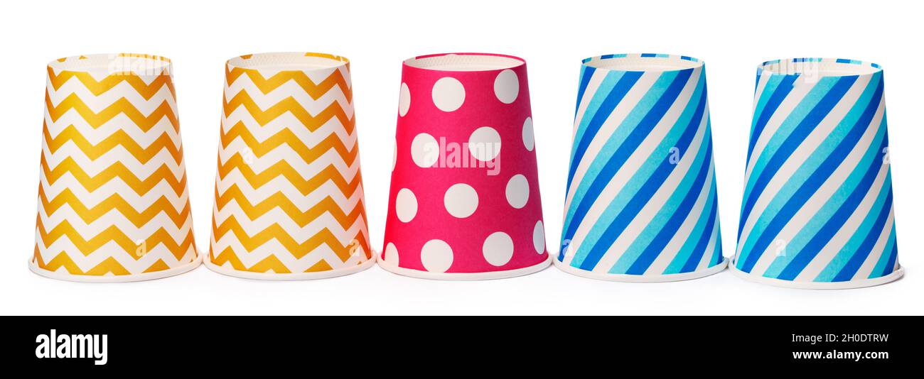 Paper disposable cups with colored pattern isolated on white background Stock Photo