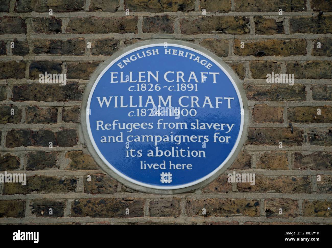 english heritage blue plaque marking a home of ellen craft and wiliam craft,  refugees from slavery and abolition campaigners, hammersmith, london Stock Photo