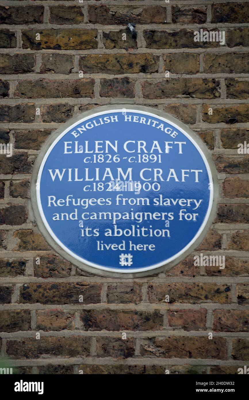 english heritage blue plaque marking a home of ellen craft and wiliam craft,  refugees from slavery and abolition campaigners, hammersmith, london Stock Photo