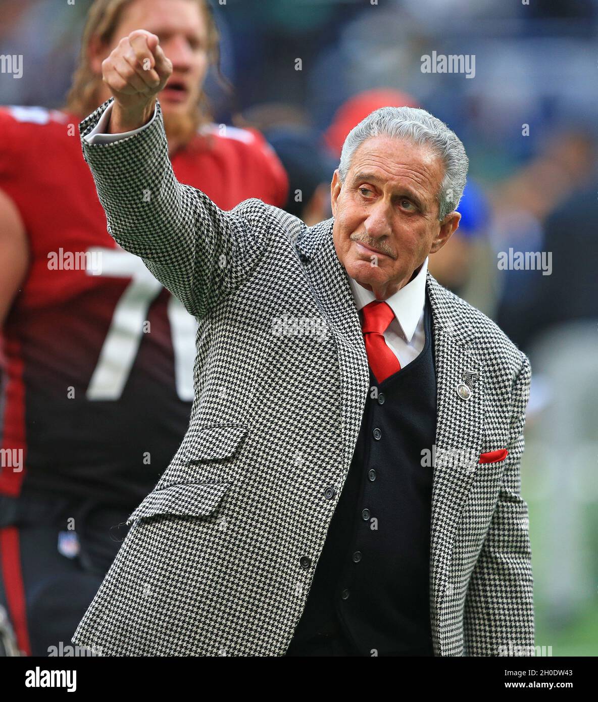 Atlanta Falcons owner Arthur Blank models a new Falcons' jersey