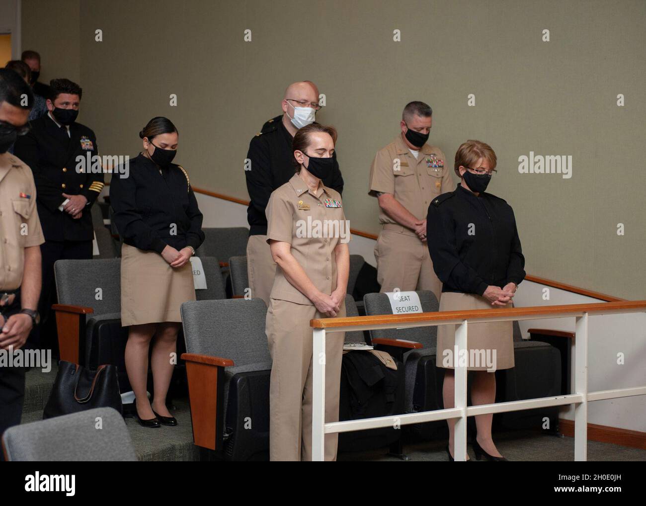 210205-N-IR096-0012 (SAN ANTONIO) Feb. 5, 2021 – Sailors bow their ...