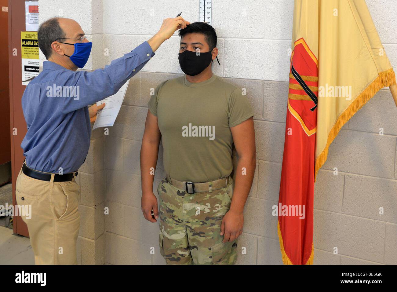 North Carolina National Guard Spc. Victor Ortiz assigned to the 113th Sustainment Brigade continues  a Periodic Health Assessment with a medical professional at the brigade’s headquarters in Greensboro, North Carolina, Feb. 7, 2021.  The assessment helps ensure Soldiers are medically ready as possible for deployments if called. Stock Photo