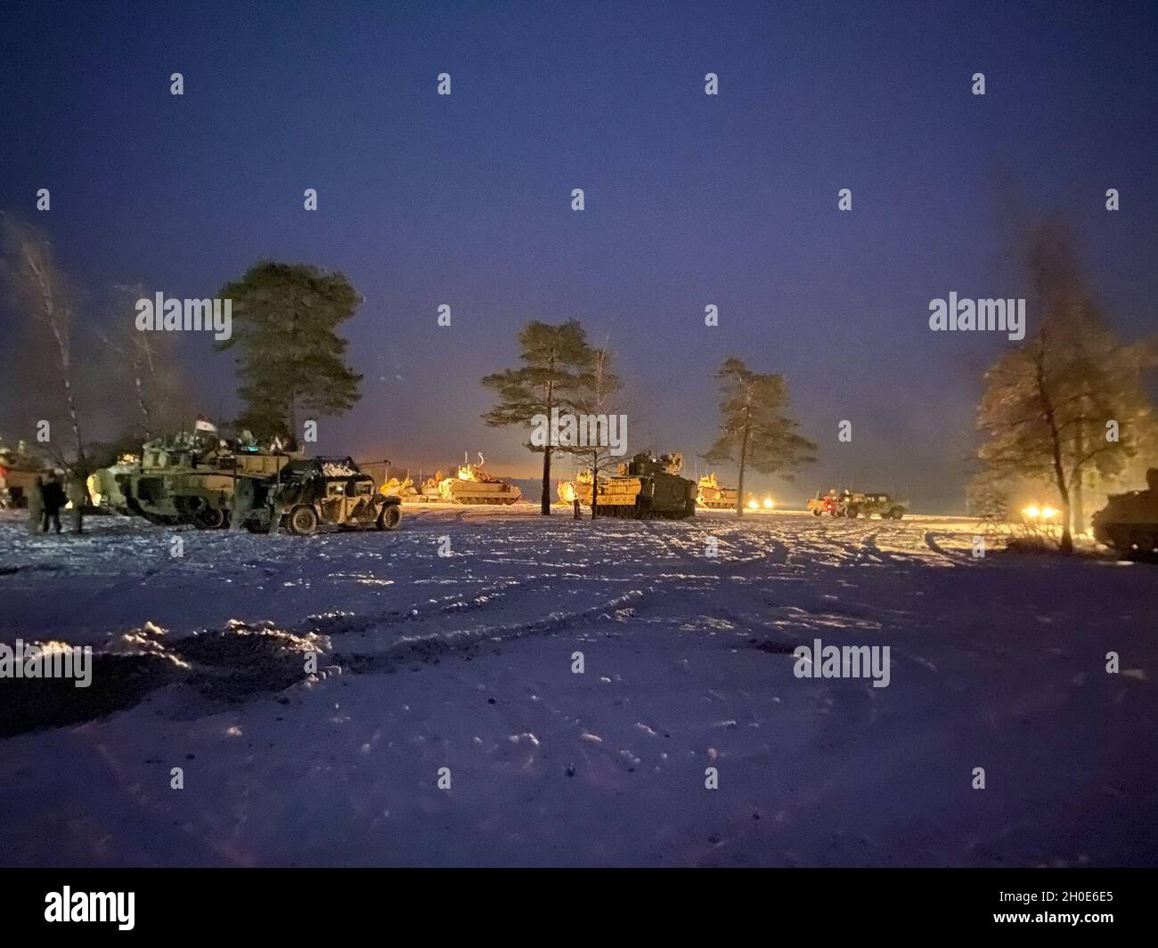 Soldiers assigned to 1st Squadron, 7th Cavalry Regiment (Garry Owen) from Fort Hood, Texas stages the Troops after conducting a live fire rehearsals during the Combined Resolve XV exercise.  Upon completion the squadron conducted night refueling operations as they prepare to execute live fire portion of the exercise at the Grafenwoehr Training Area. Stock Photo