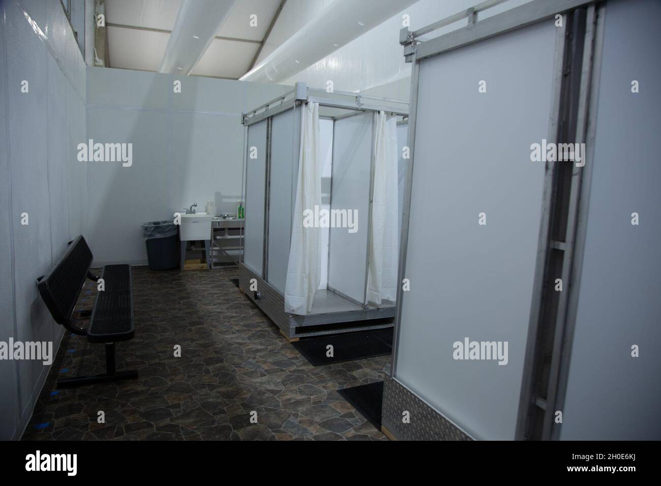 Temporary processing facilities are constructed in Donna, Texas, Feb. 8, 2021, to safely process individuals encountered by, and in the custody of, the U.S. Border Patrol. The facility will provide processing capacity in the RGV while the permanent Centralized Processing Center in McAllen is renovated. U.S. Border Patrol Stock Photo