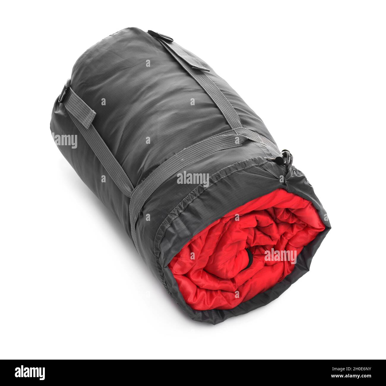 Sleeping bag in case on white background. Camping equipment Stock Photo -  Alamy