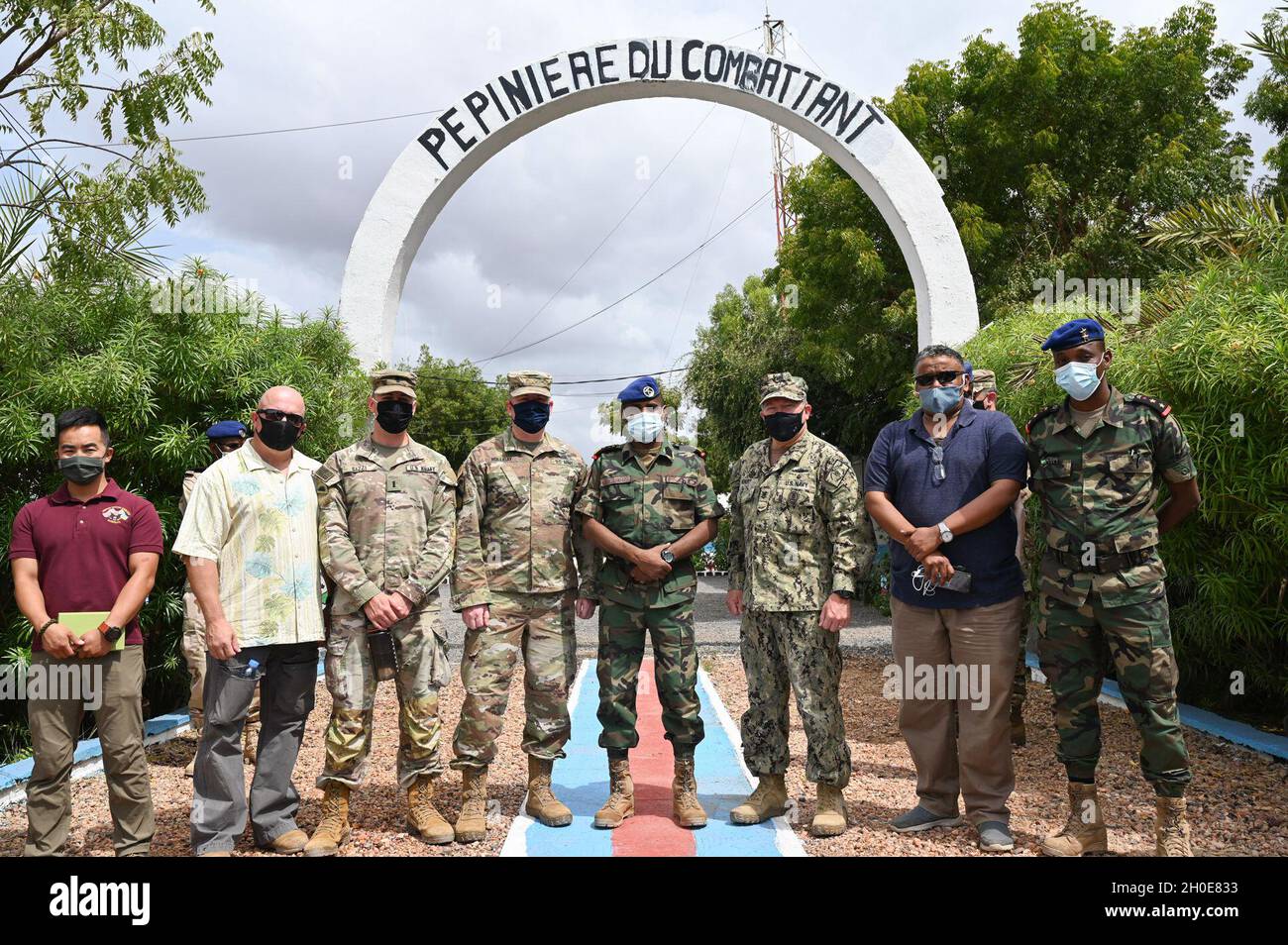 Members of the Combined Joint Task Force- Horn of Africa (CJTF-HOA) staff, Civil Affairs East Africa, the Kentucky National Guard and U.S. Embassy Djibouti pose for a photo at the FAD military training center at Holhol, Djibouti Feb. 8, 2021. The visit offered an opportunity to see the current training facility and discuss future endeavors between organizations. Stock Photo