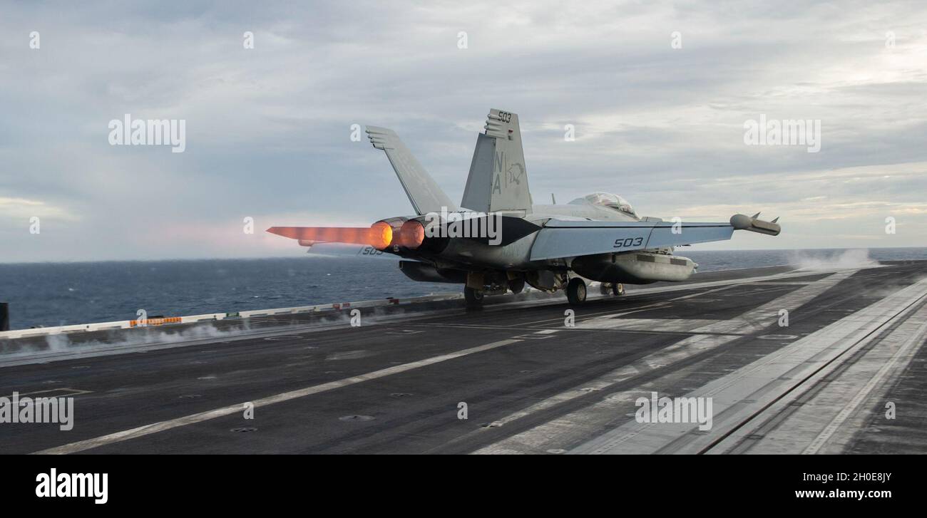 210209-N-EB640-1210 SOUTH CHINA SEA (Feb. 9, 2021) An E/A-18G Growler ...