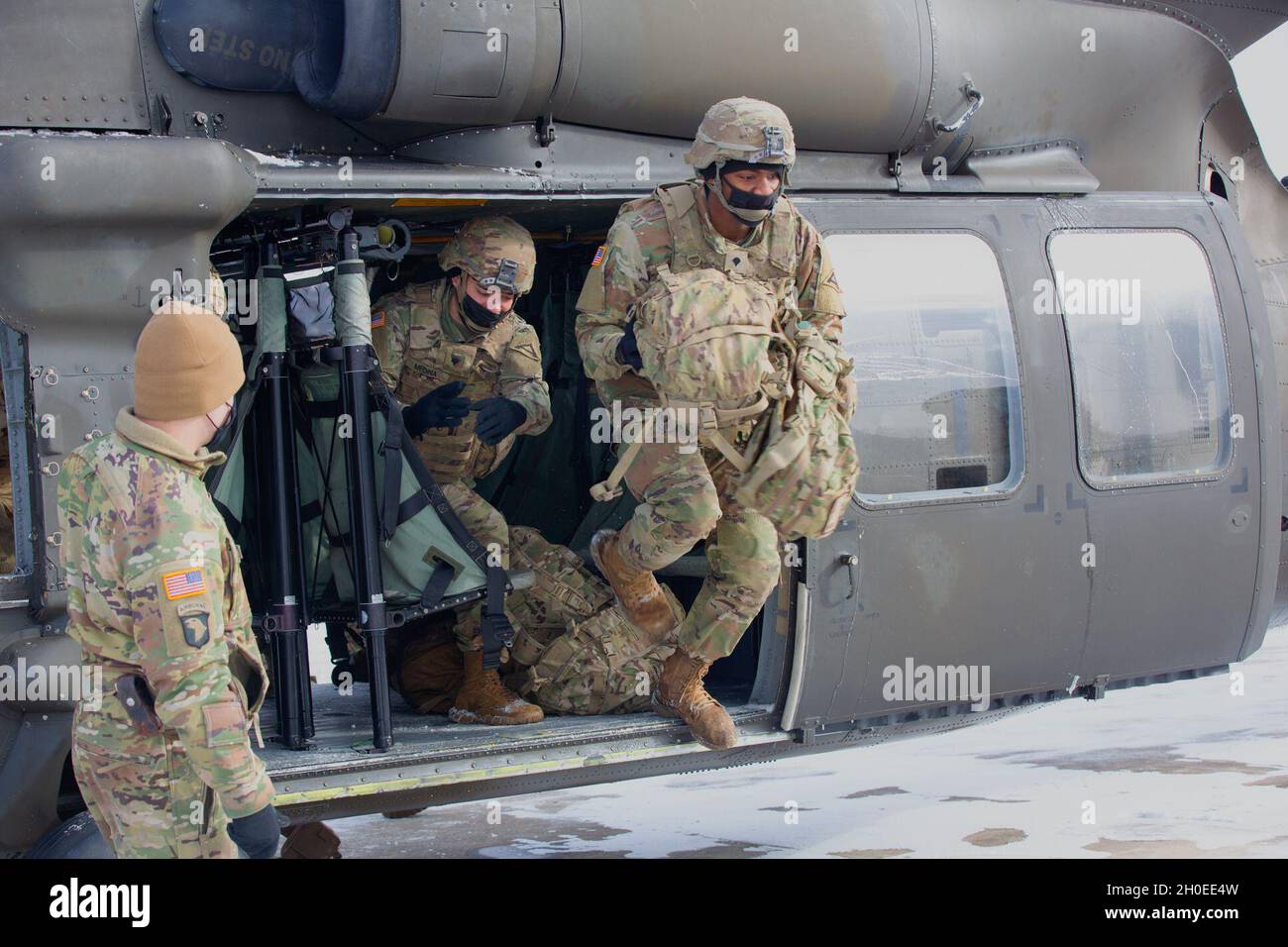 U.S. Army Soldiers exit a UH-60 Black Hawk helicopter in Hohenfels ...