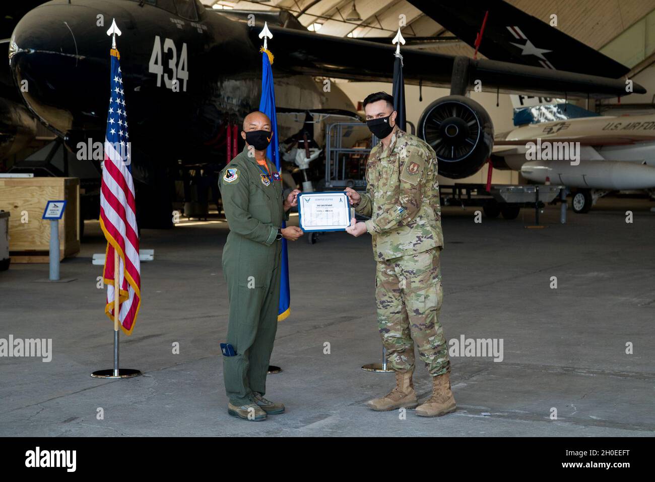 1st Lt. Cody Bronkar, 412th Communications Squadron, accepts his U.S