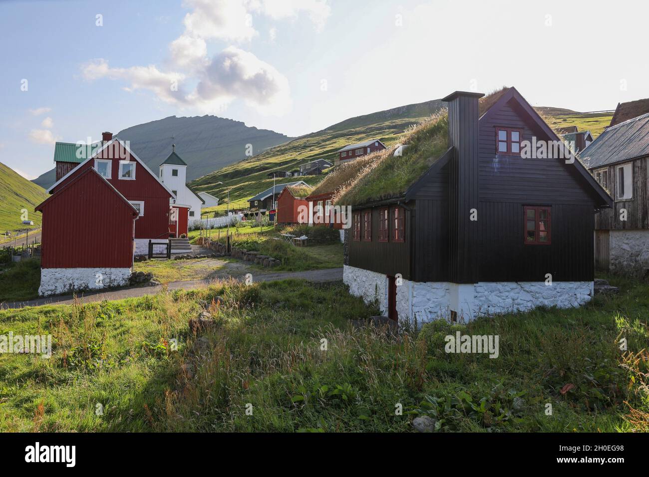 Traditional grass roof houses in Elduvik, Eysturoy Island, Faroe Islands, Scandinavia, Europe Stock Photo