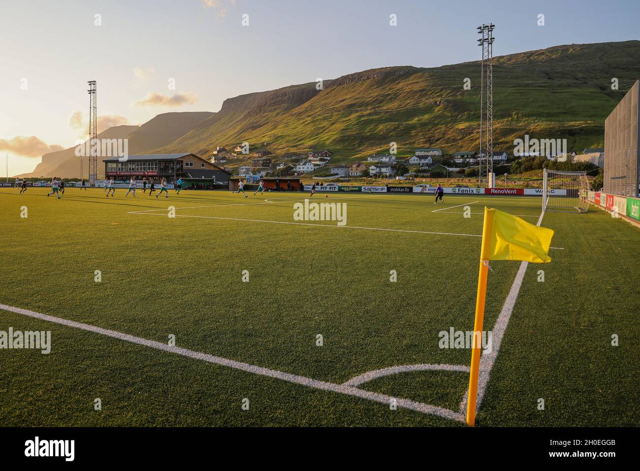 Women playing football in Sorvagur, Vagar Island, Faroe Islands, Europe. Stock Photo