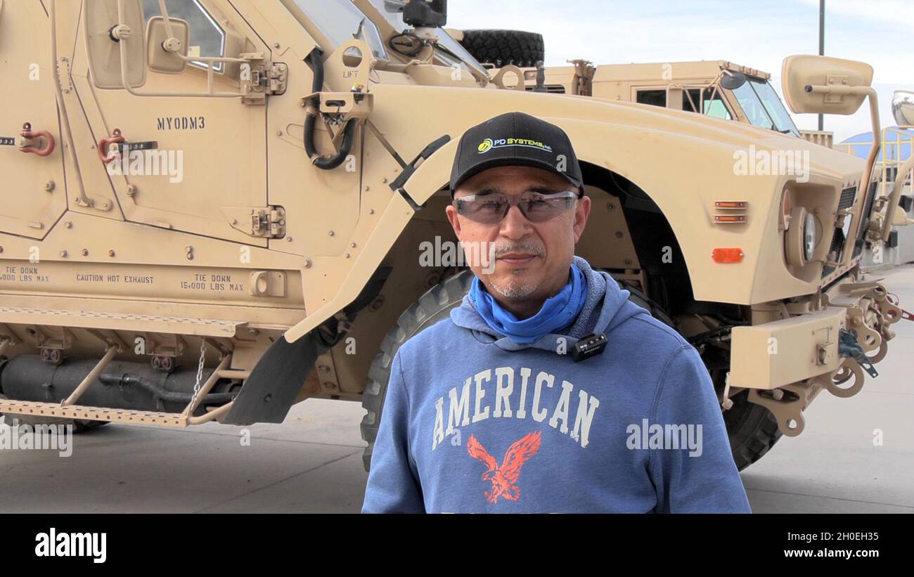 Francisco Lopez, storage services team leader at Fort Hunter Liggett's ECS 170, stood in front of a M-ATV mine-resistant vehicle which had just been serviced. Equipment may have been damaged during use and a full inspection is done to know what work orders to send out. “Basically, the Soldiers take fairly good care of the equipment,” he said, adding, “We try to perform our best for the United States military.” Stock Photo