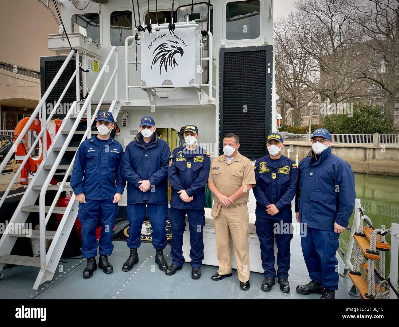 WASHINGTON D.C. (Feb. 12, 2021) — The command of USCGC Hawk (WPB 87355), hosts members of the Colombian Embassy to discuss Coast Guard operations aboard USCGC Hawk (WPB 87355) on the Potomac River in Washington D.C. on Feb. 12, 2021. The visit provided an opportunity for familiarization with U.S. Coast Guard sea-service operations and ships. Hawk is an 87-foot Marine Protector-Class patrol boat home-ported in Virginia Beach, Virginia, with a crew of 12. Stock Photo