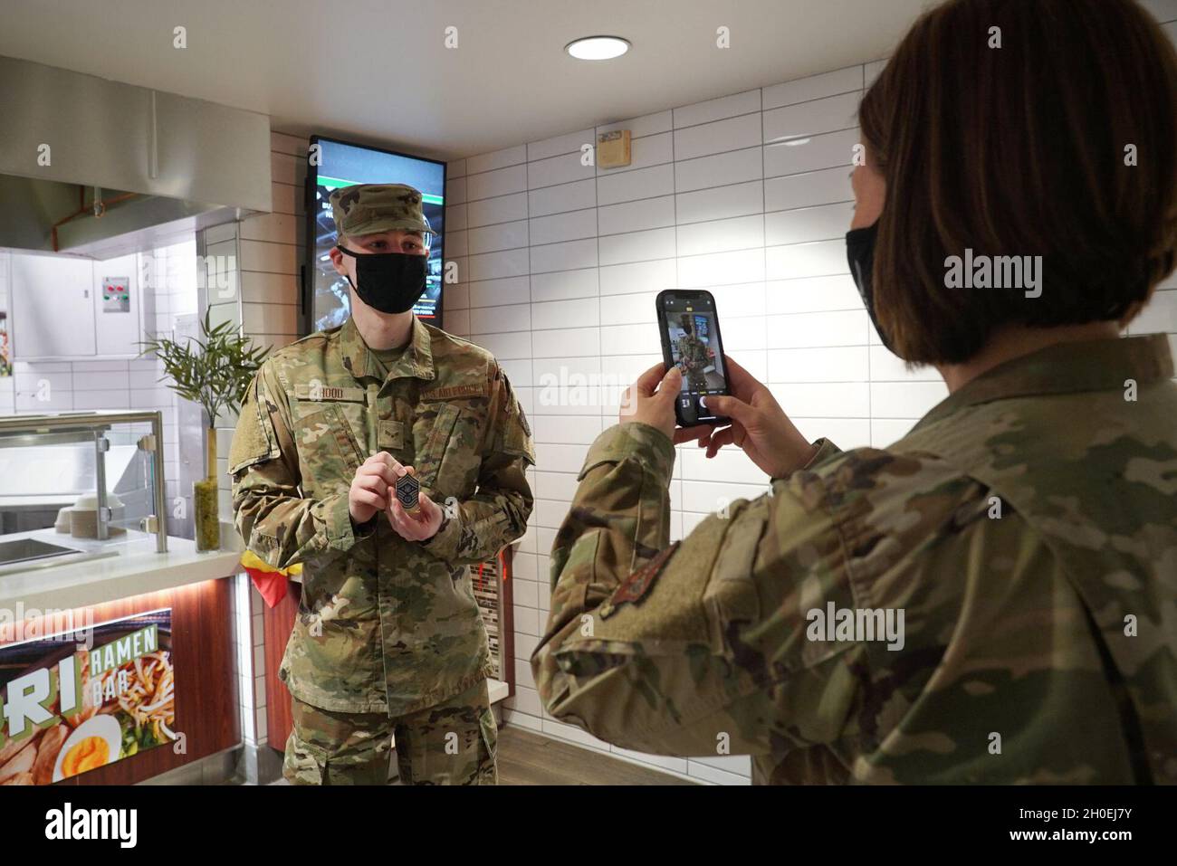 Chief Master Sgt. of the Air Force JoAnne S. Bass takes a photo of