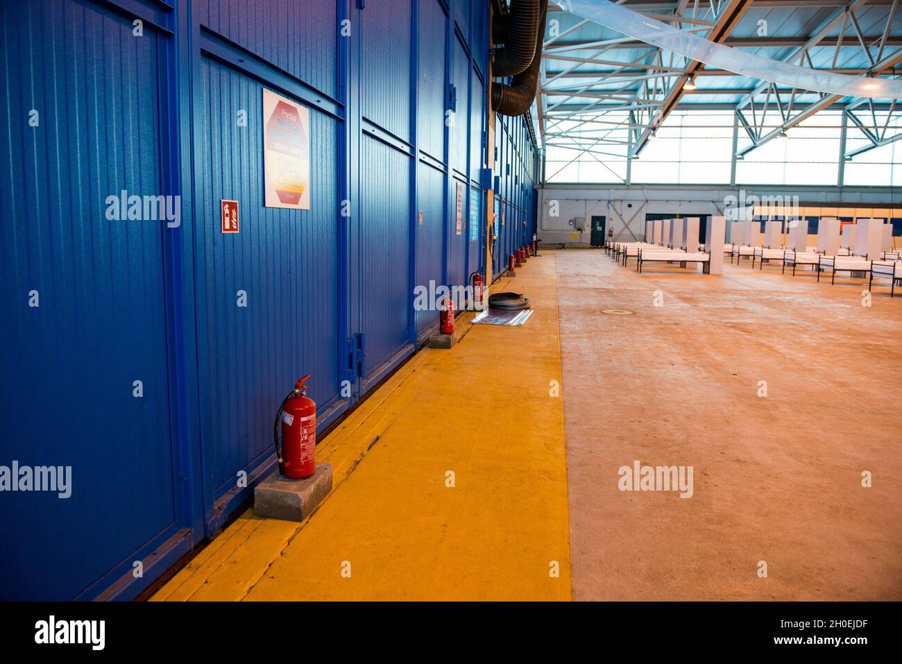 Fire extinguishers and Covid-19 signage provide safety next to the ...