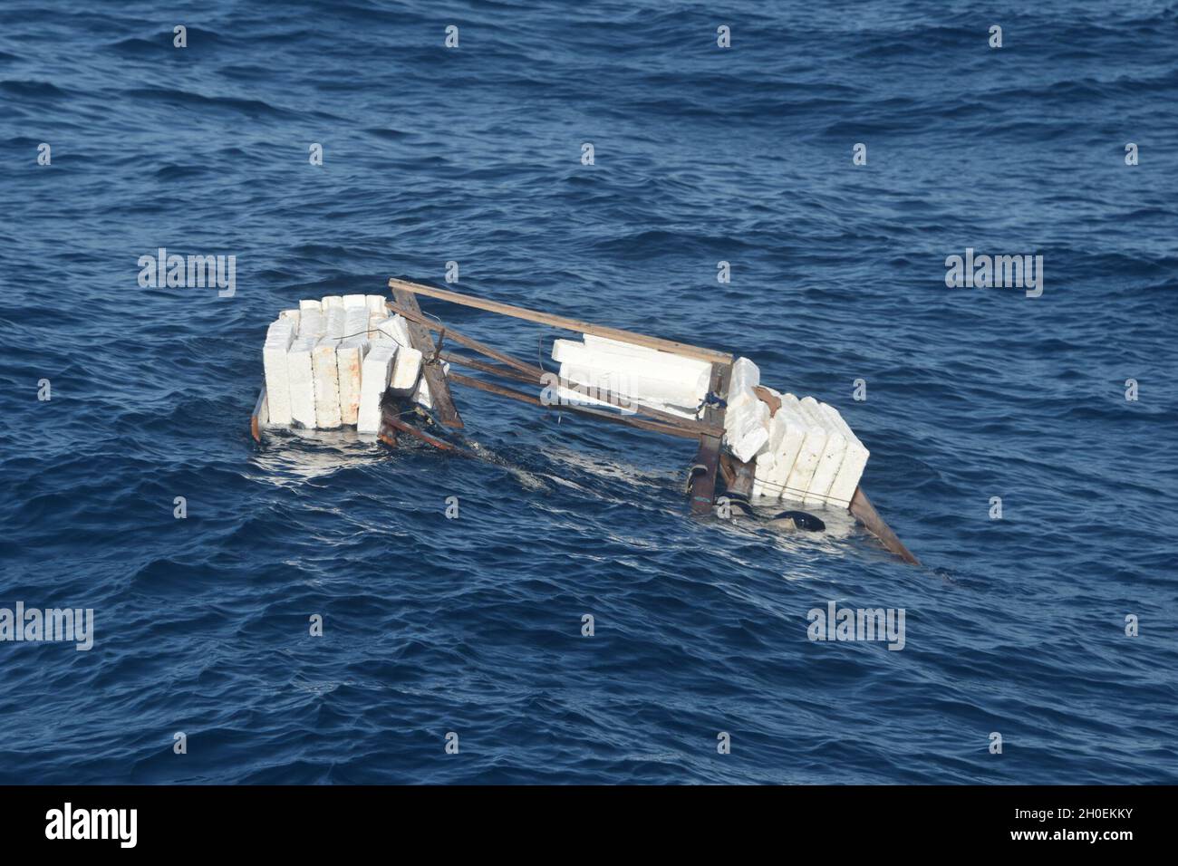 A makeshift raft is sunken approximately 8 miles south of Long Key ...