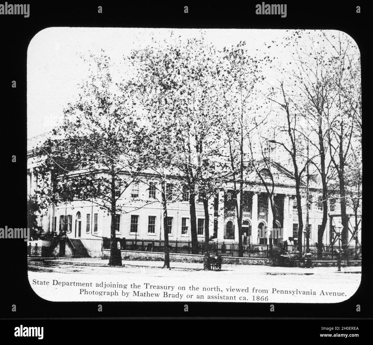 Lantern Slide 14: The State Department at the center and the Treasury at the left in this photograph by Mathew Brady in 1856. This of course was prior to the construction of the old State, War and Navy Building in 1871-1893. The corner stone for the White House was laid October 13, 1792. John Adams was the first president to occupy the building, in November 1800. Stock Photo