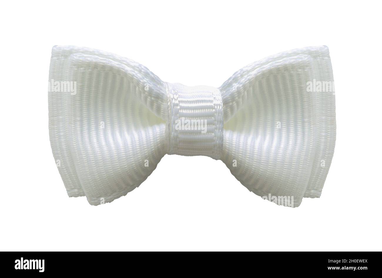 Small White Bow Tie Cut Out on White. Stock Photo