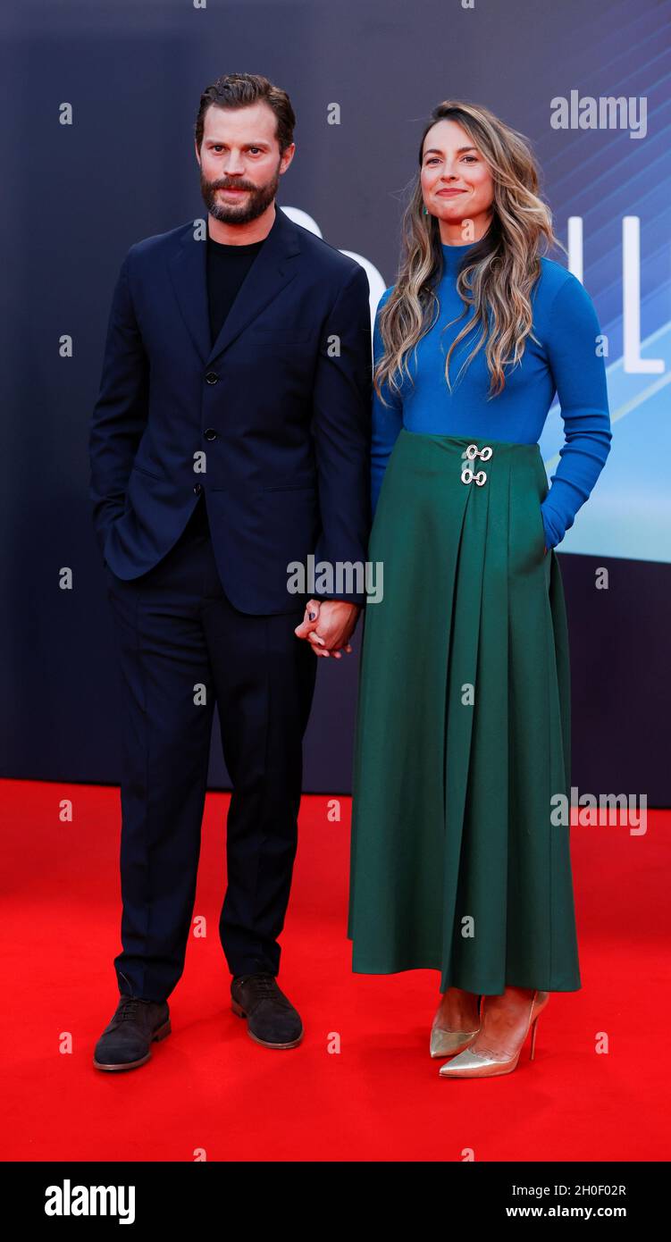 Cast member Jamie Dornan and Amelia Warner arrive at a screening of the  film "Belfast" as