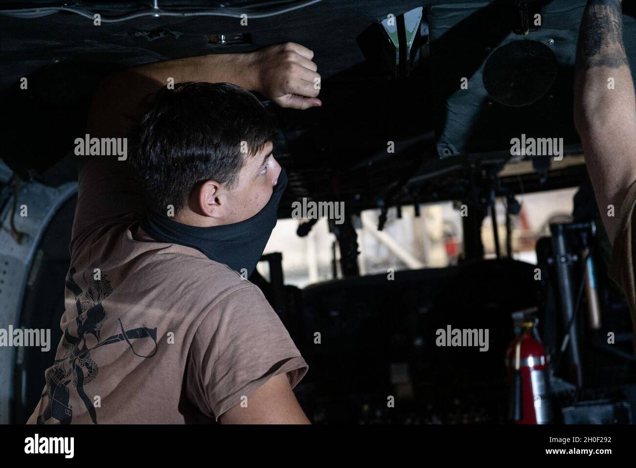210220-N-RC007-1002 RODMAN, PANAMA (Feb. 20, 2021) Aviation Electronics Technician 2nd Class Logan Fields from Bristol, Tenn., performs maintenance on the interior of a MH-60S Seahawk helicopter assigned to the “Wildcards” of Helicopter Sea Combat Squadron (HSC) 23 aboard the Freedom-class littoral combat ship USS Freedom (LCS 1) during a planned maintenance availability (PMAV) in Rodman, Panama, Feb. 20, 2021. Freedom is deployed to the U.S. 4th Fleet area of operations to support Joint Interagency Task Force South's mission, which includes counter-illicit drug trafficking missions in the Car Stock Photo