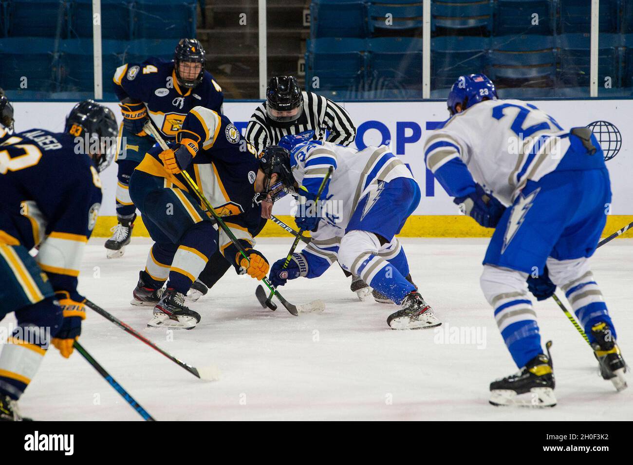 U.S. AIR FORCE ACADEMY, Colo. -- Air Force forward Thomas Daskas faces off against Canisius College forward Matt Long during a home game at the Academy’s Cadet Ice Arena, Feb. 20, 2021. Air Force defeats Canisius 5-1. Stock Photo