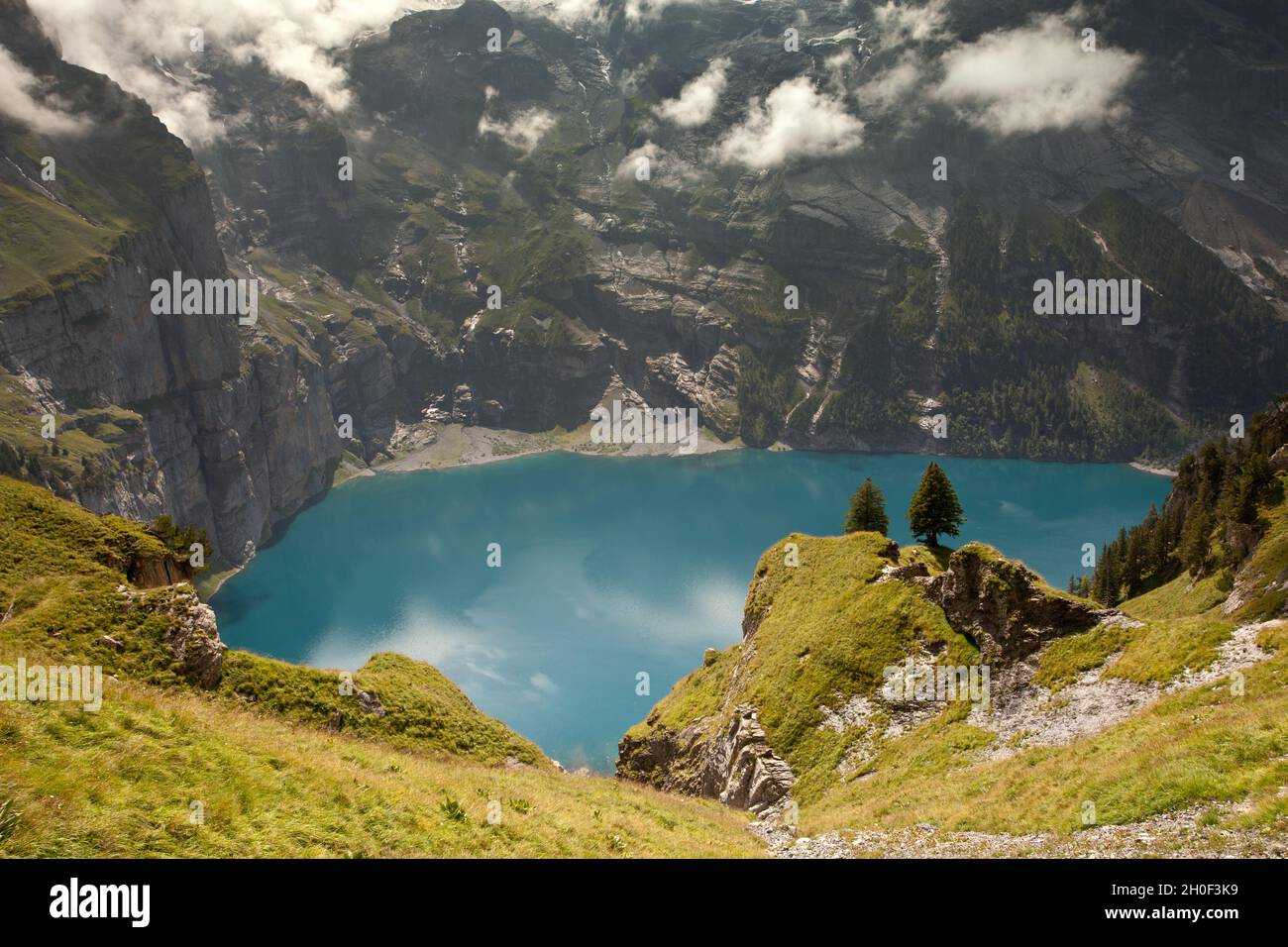 Oeschinen Lake with Larches Stock Photo