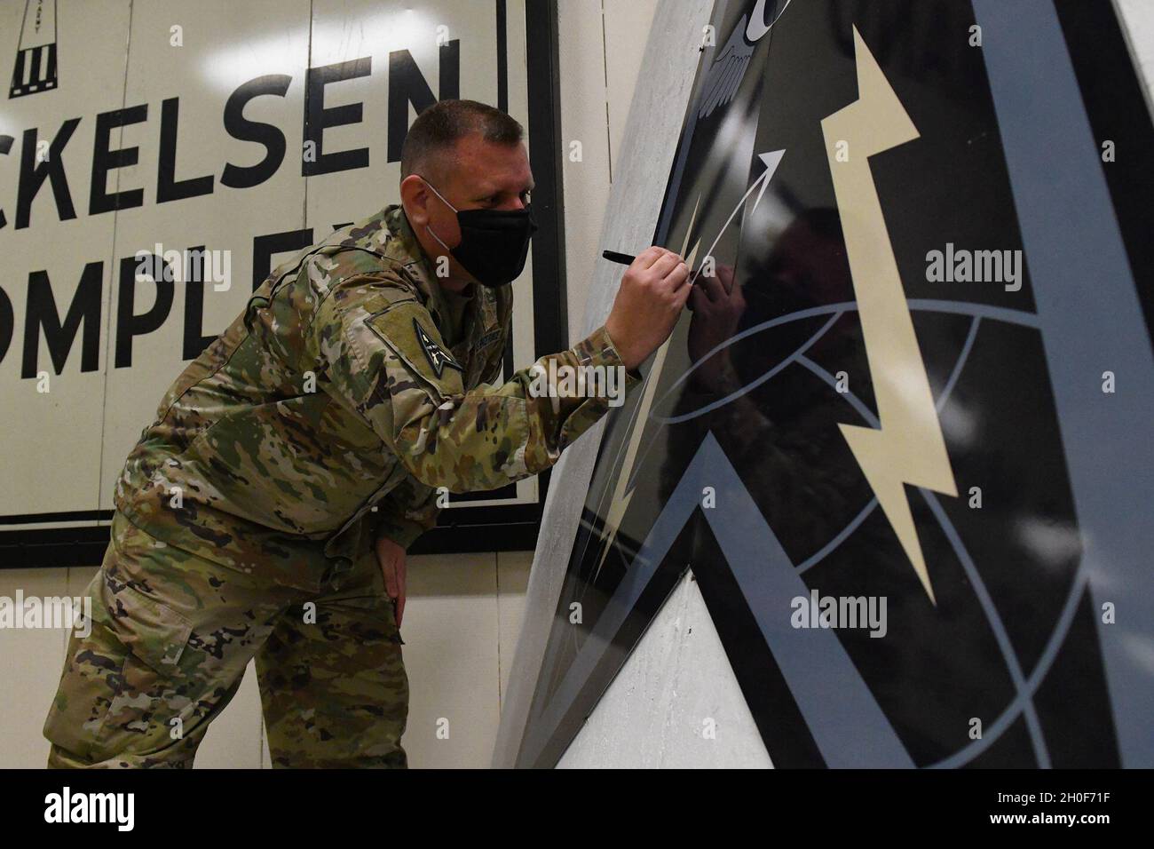 U.S. Space Force Col. Richard Bourquin, Space Delta 4 commander, signs ...