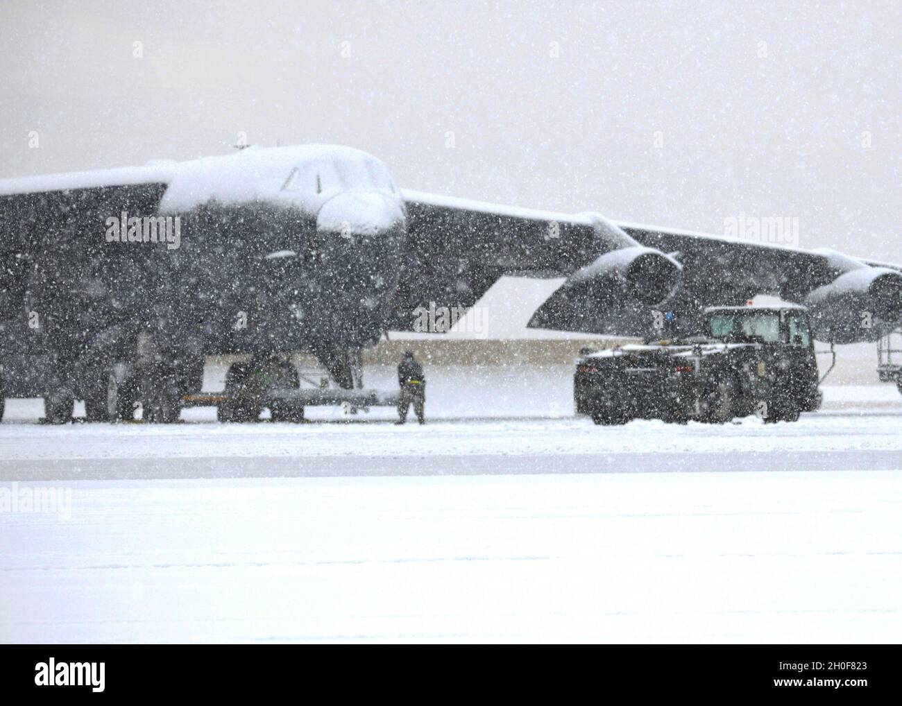 A B-52H Stratofortress idles as Airmen get ready to fly at Minot Air Force  Base, North Dakota, Feb. 24, 2021. The bomber is capable of flying at high  subsonic speeds at altitudes