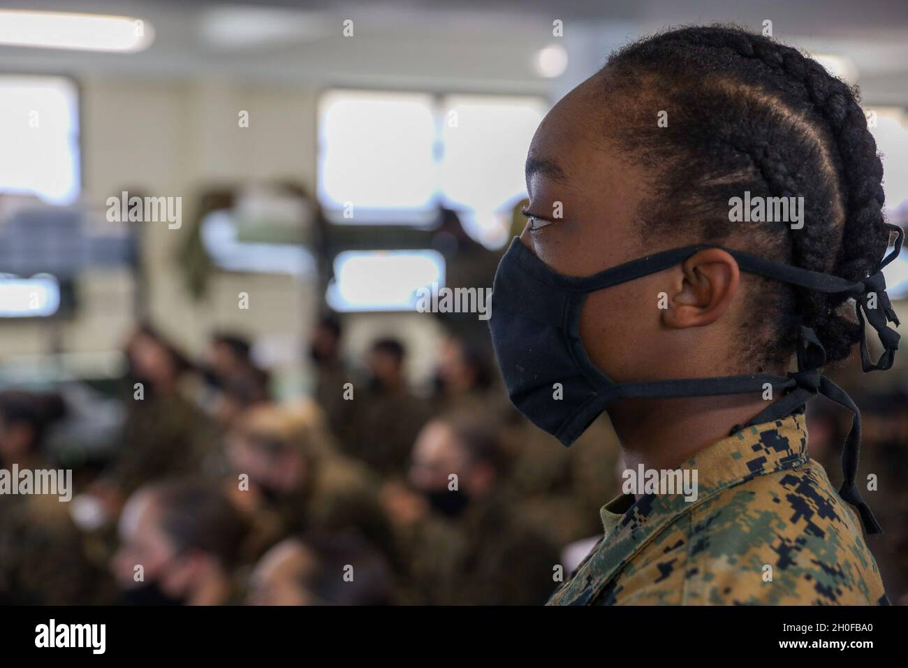 Recruits with Oscar Company, 4th Recruit Training Battalion, listen to a class on Marine Corps Recruit Depot Parris Island, S.C. Feb. 24, 2021. Recruits take classes to prepare for final testing which is a graduation requirement. Stock Photo
