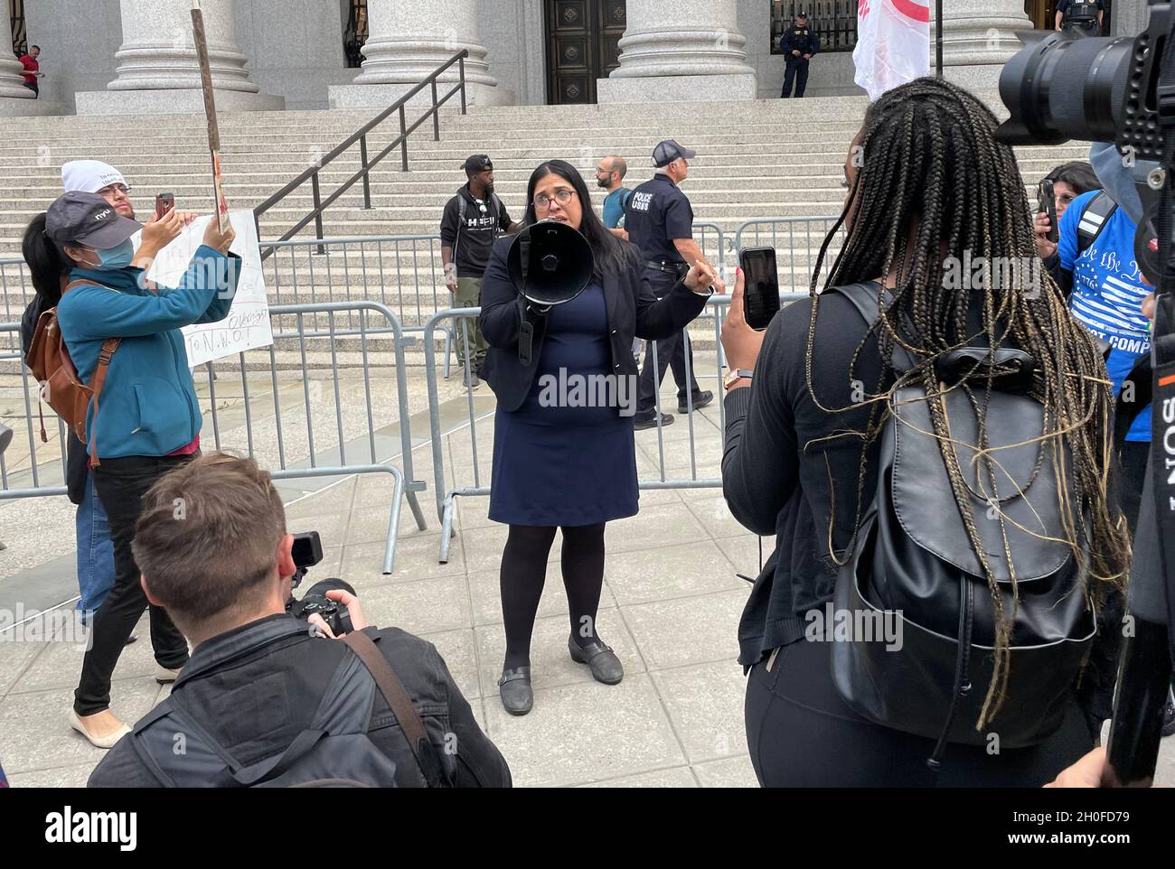 New York, NY, USA. 12th Oct, 2021. Sujata Gibson, attorney for Michael Kane, speaks outside the Thurgood Marshall US Courthouse where a hearing for Kane versus de Blasio is taking place where teachers are suing against vaccine mandates stating that they are immoral and illegal in New York City on on October 12, 2021. Credit: Rainmaker Photos/Media Punch/Alamy Live News Stock Photo